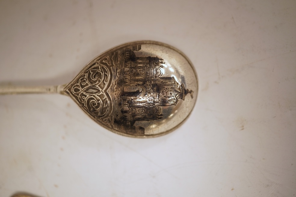 A small collection of nine assorted Georgian and later small silver or white metal spoons, including mustard ladles and other condiment spoons, a caddy spoon, London, 1799, together with a 19th century Russian 84 zolotni